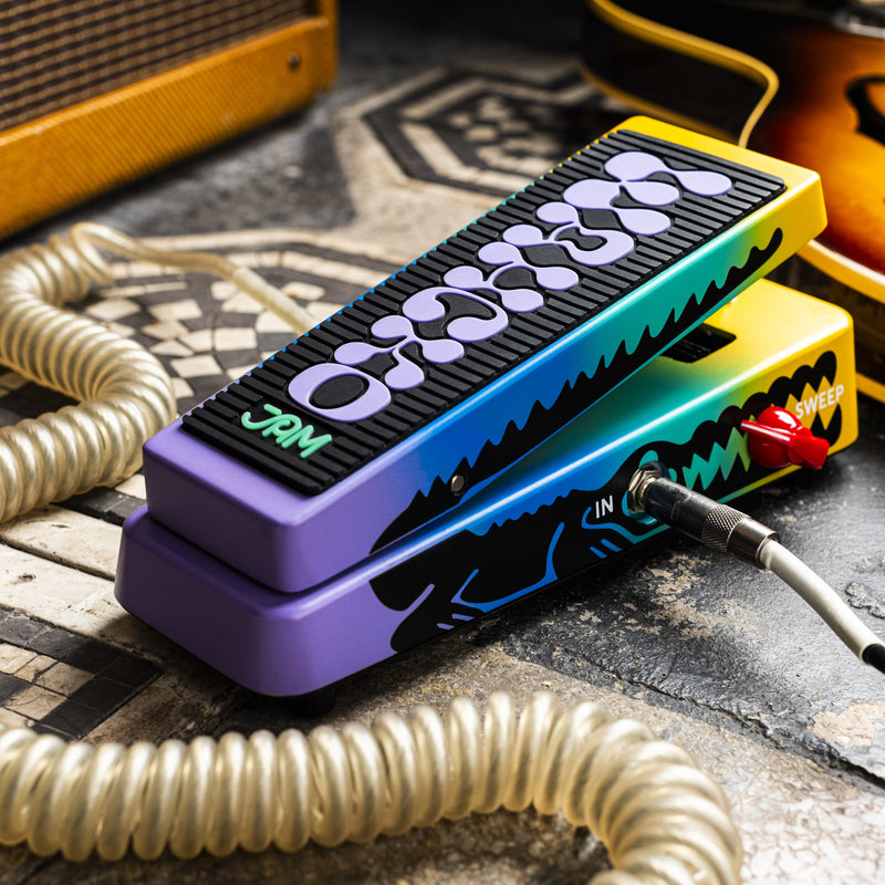 JAM Pedals Wahcko MK 2 wah pedal on a pedalboard floor with coiled cable