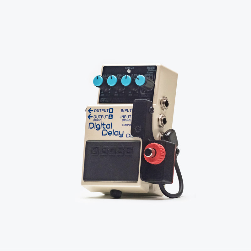 Cltchworks BS-1M momentary footswitch mounted on a BOSS pedal | Echoinox Singapore