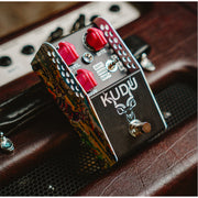 Thorpy KUDU Overdrive pedal on a vintage amplifier, angled view showing enclosure artwork
