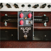 Thorpy KUDU Overdrive pedal standing on a guitar amplifier, front view
